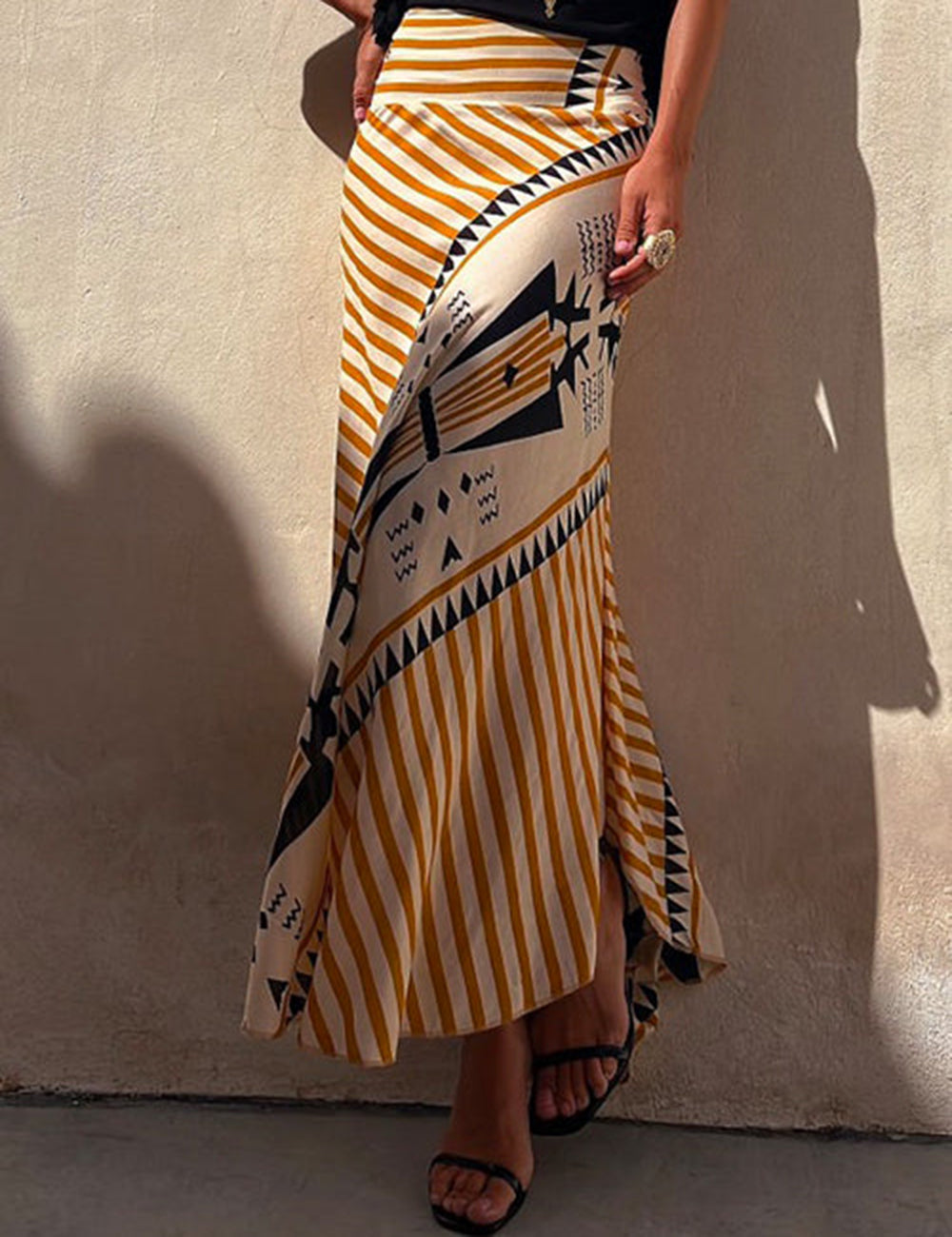High-Waisted Striped Maxi Skirt with Asymmetrical Hem